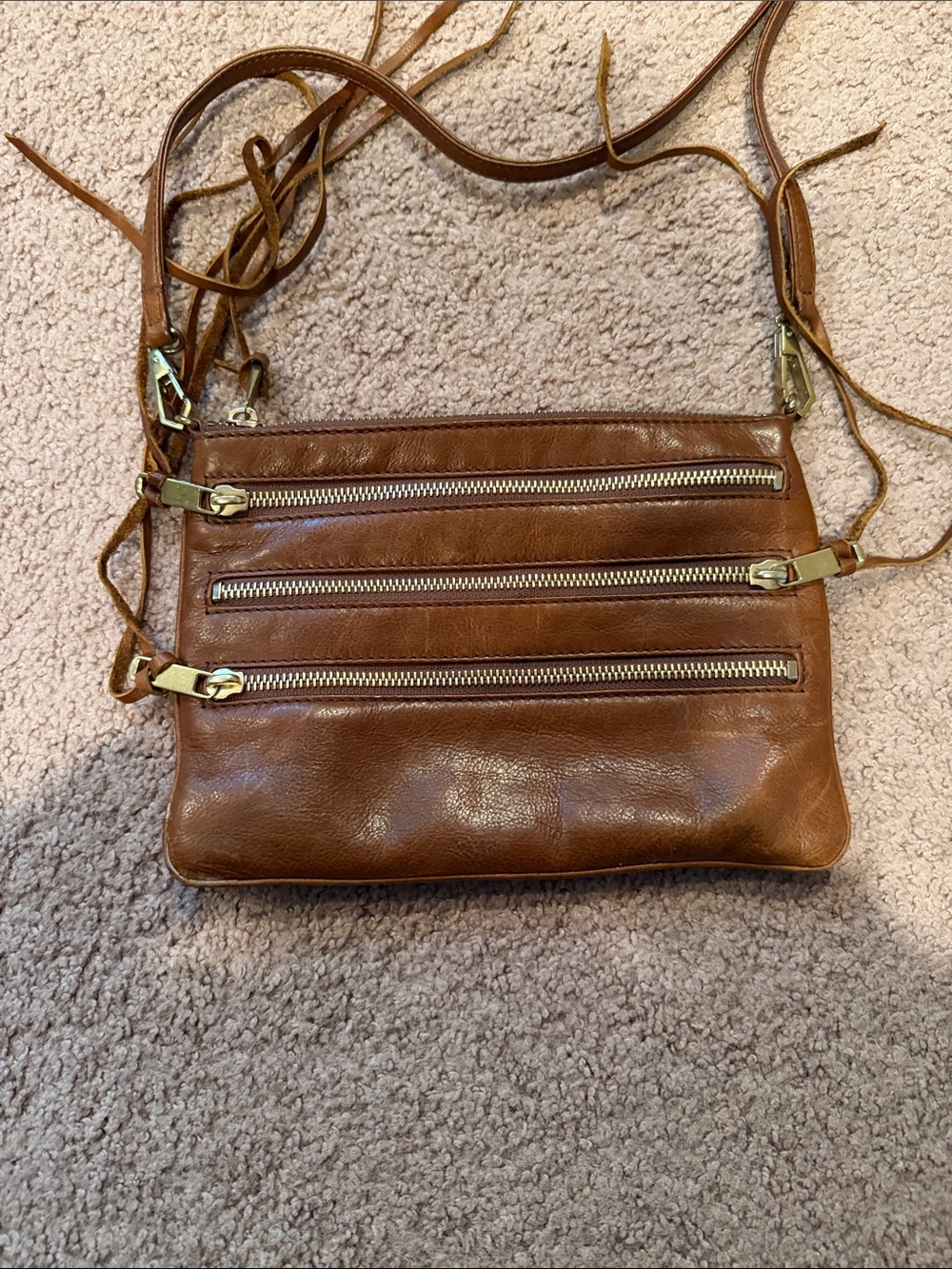 Rebecca Minkoff Women’s Tan Leather Crossbody Bag with Triple Zip Front Pockets